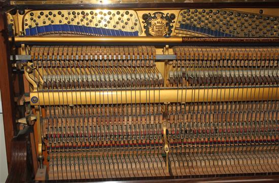 An early 20th century Bluthner rosewood cased upright piano,